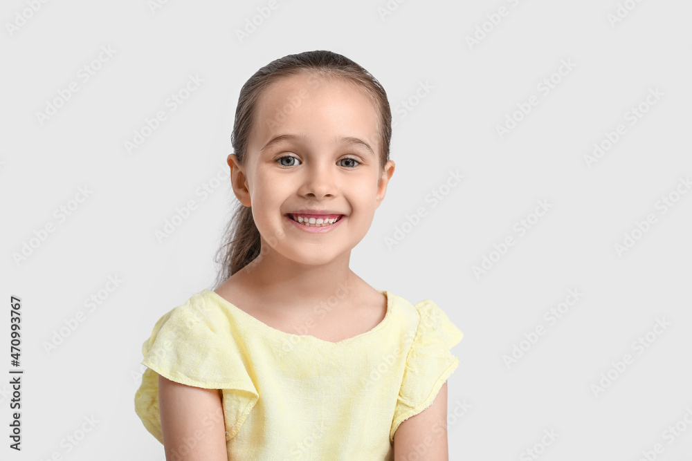 Portrait of smiling little girl on white background Portrait of smiling little girl on white background
