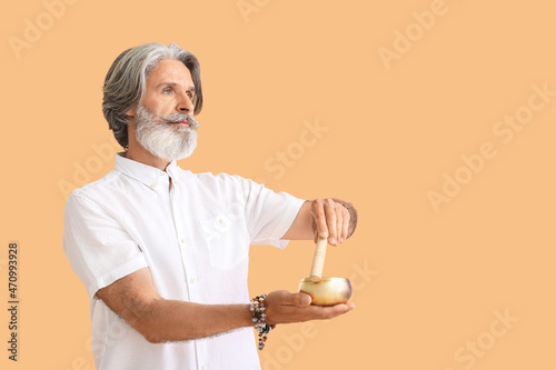 Mature man with Tibetan sin...