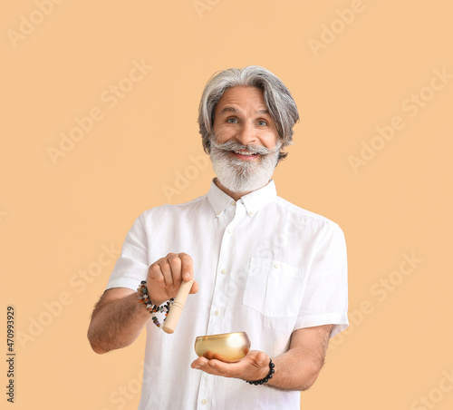 Mature man with Tibetan sin...