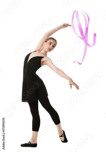 Beautiful young woman doing gymnastics with ribbon on white background © Pixel-Shot