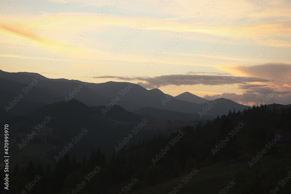 Picturesque view of mountains under beautiful sky in early morning