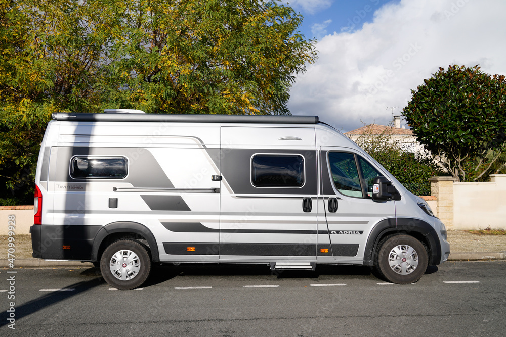 Fiat ducato Adria RV holiday trip in motorhome Caravan car Vacation with  camper van parked in city Stock Photo | Adobe Stock