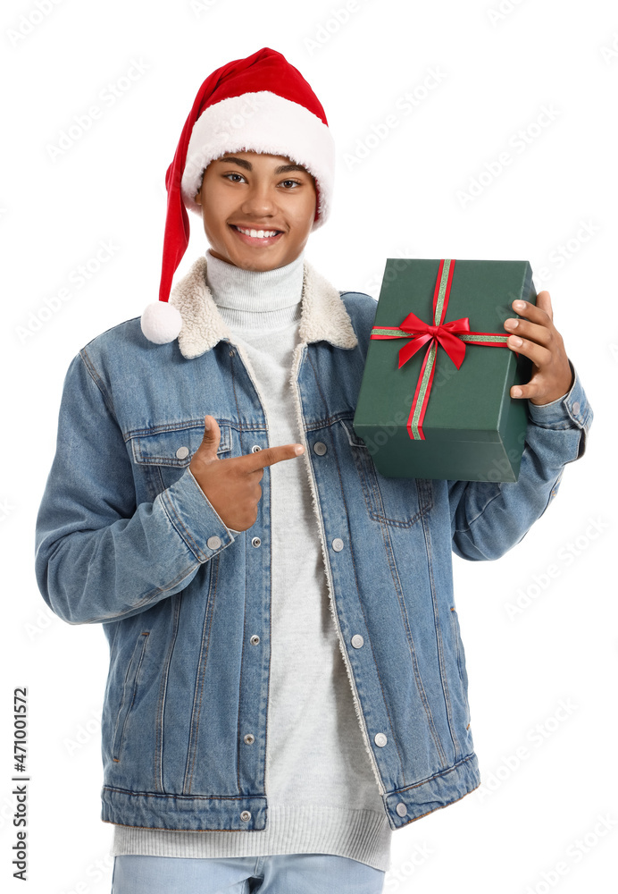 African-American man with Christmas gift on white background African-American man with Christmas gift on white background