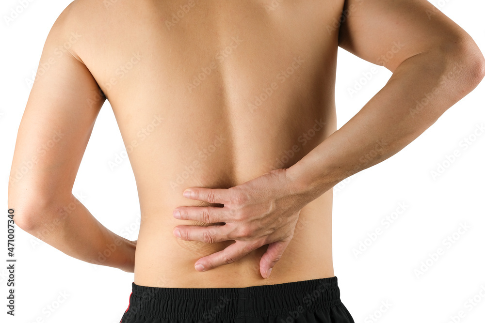 A man presses his hand against his back, has back pain and bone pain. A man presses his hand against his back, has back pain and bone pain.