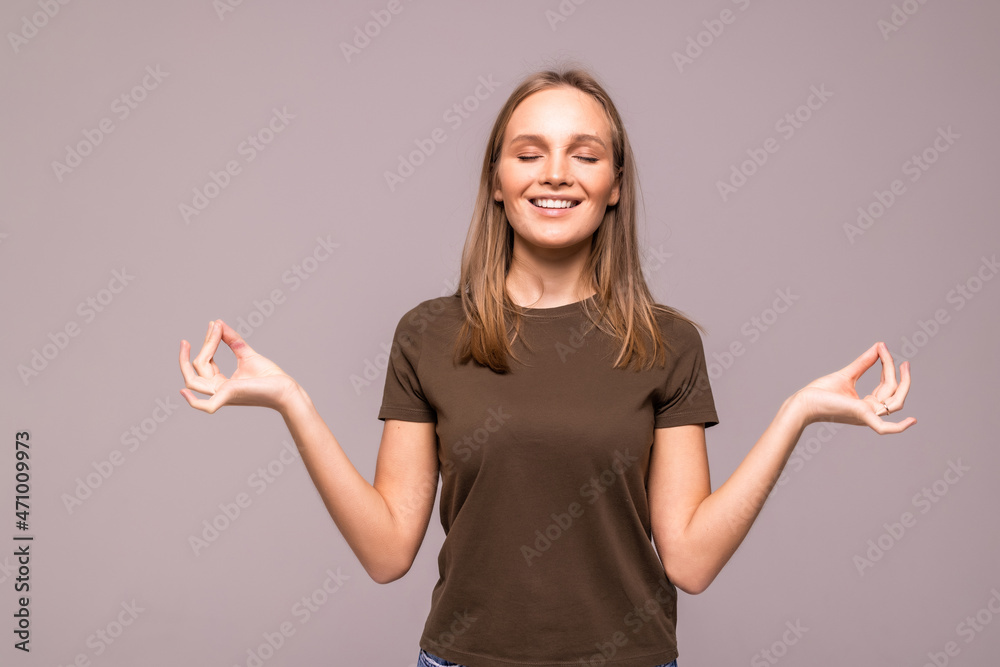 healthy young woman meditating over white background healthy young woman meditating over white background