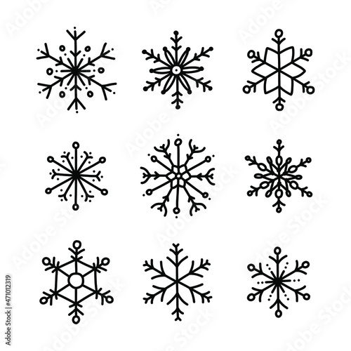 Vector set with doodle snowflakes. Black snowflakes isolated on white background.