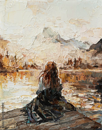 .The girl in the rays of the setting sun. The woman is sitting on the shore of the lake. Oil painting on canvas. photo