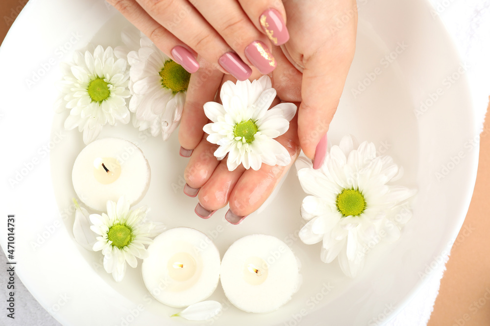 Concept of hand care on beige background