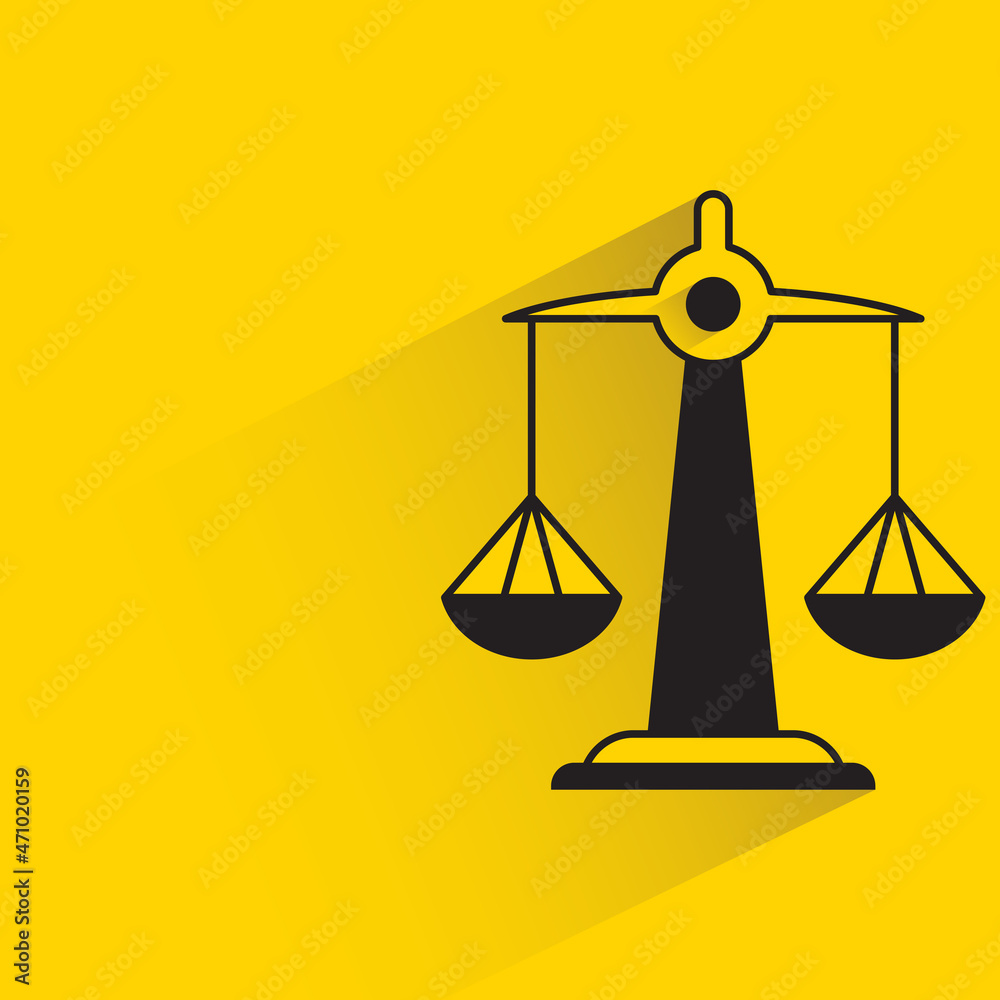 justice balance scale with shadow yellow background justice balance scale with shadow yellow background
