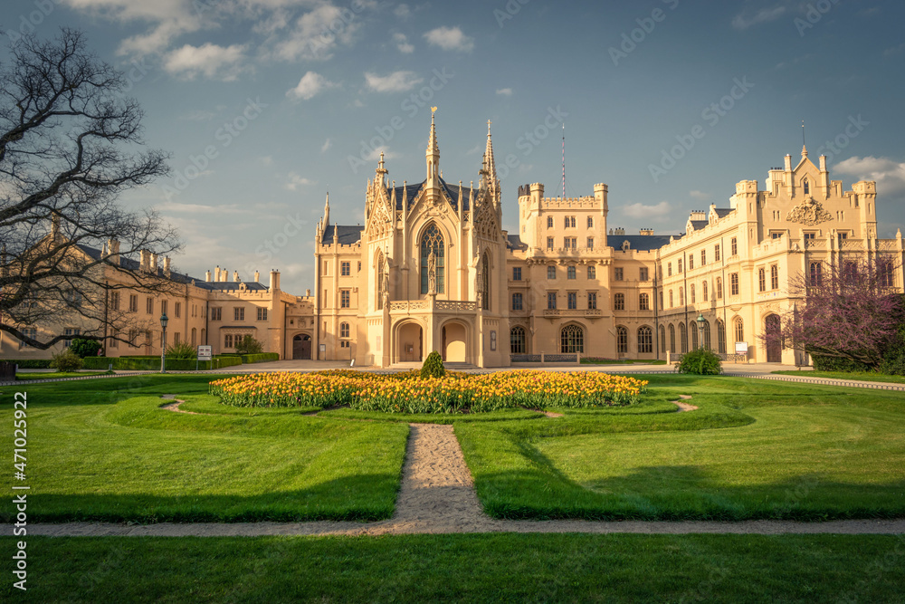 Ornamental flowerbed with blooming tulips in front of the castle in Lednice, Czechia