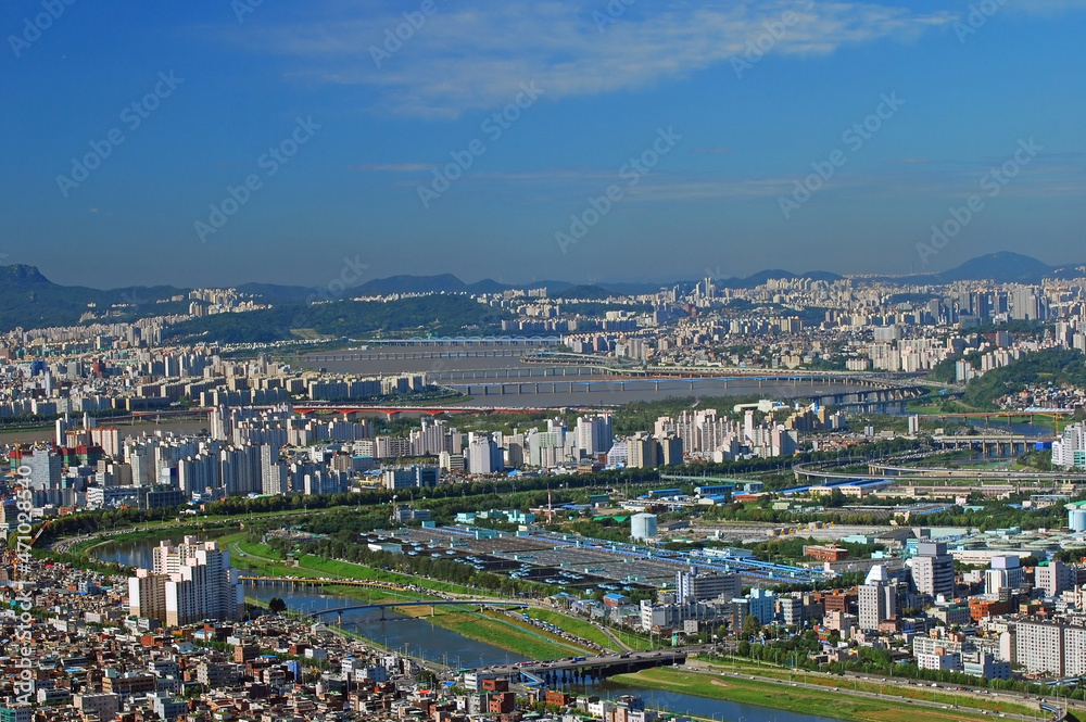 Jungnangcheon Stream and han river and Seoul cityscape from the aerial view - Korea