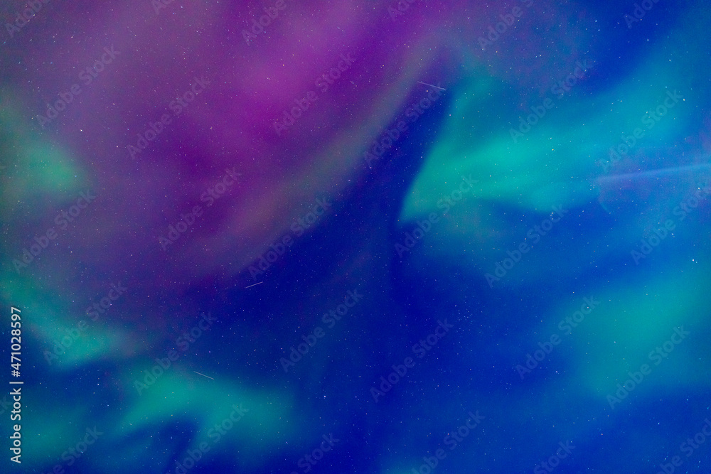Arctic polar night starry sky background of aurora borealis and Northern Lights