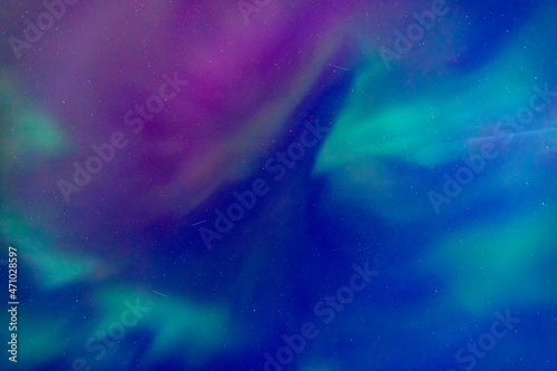 Arctic polar night starry sky background of aurora borealis and Northern Lights