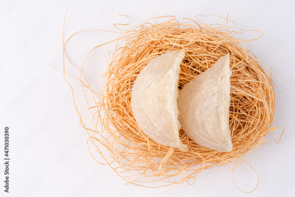 Top Grade edible bird nest shoot on white background with negative