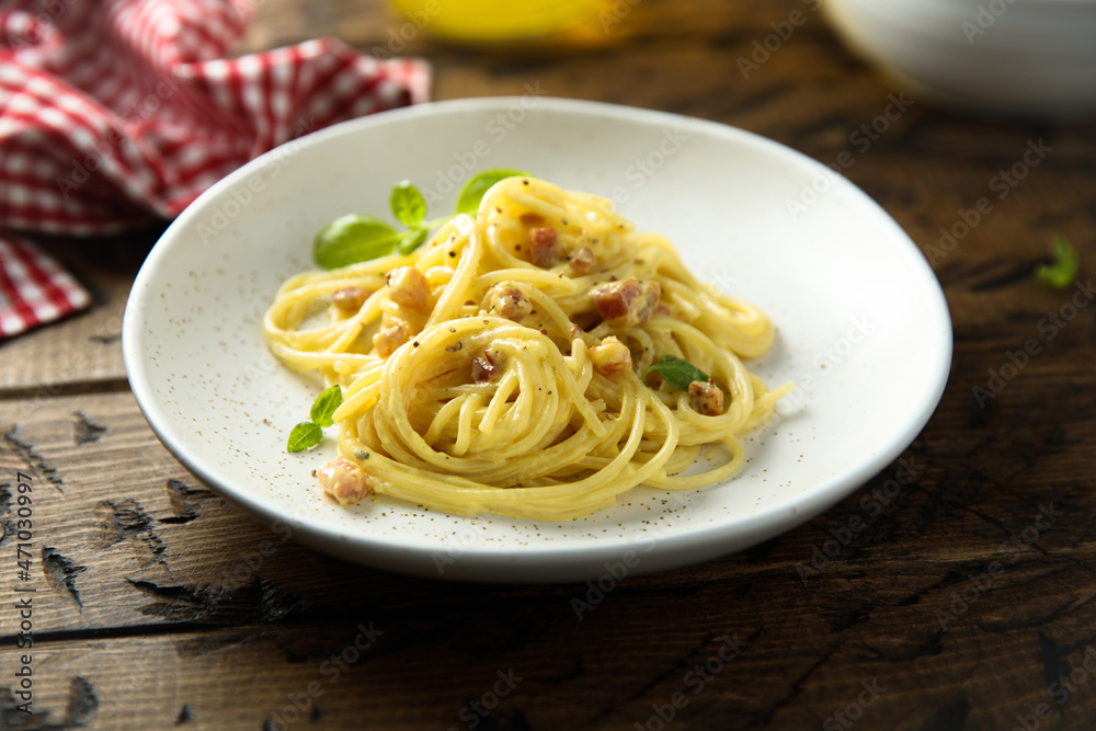 Traditional pasta Carbonara with egg and pork