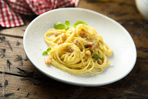 Traditional pasta Carbonara with egg and pork