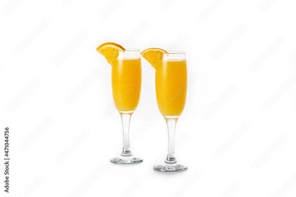 Orange mimosa cocktail isolated on white background Orange mimosa cocktail isolated on white background
