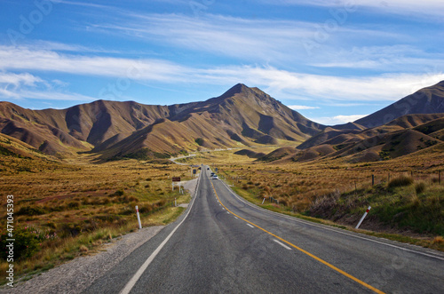 Road in the middle of the mountains. Spectacular landscape in New Zealand.