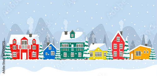 Snowy day in a cozy Christmas panorama of the city. Winter christmas village landscape. Colorful houses Iceland, North Pole, Holland