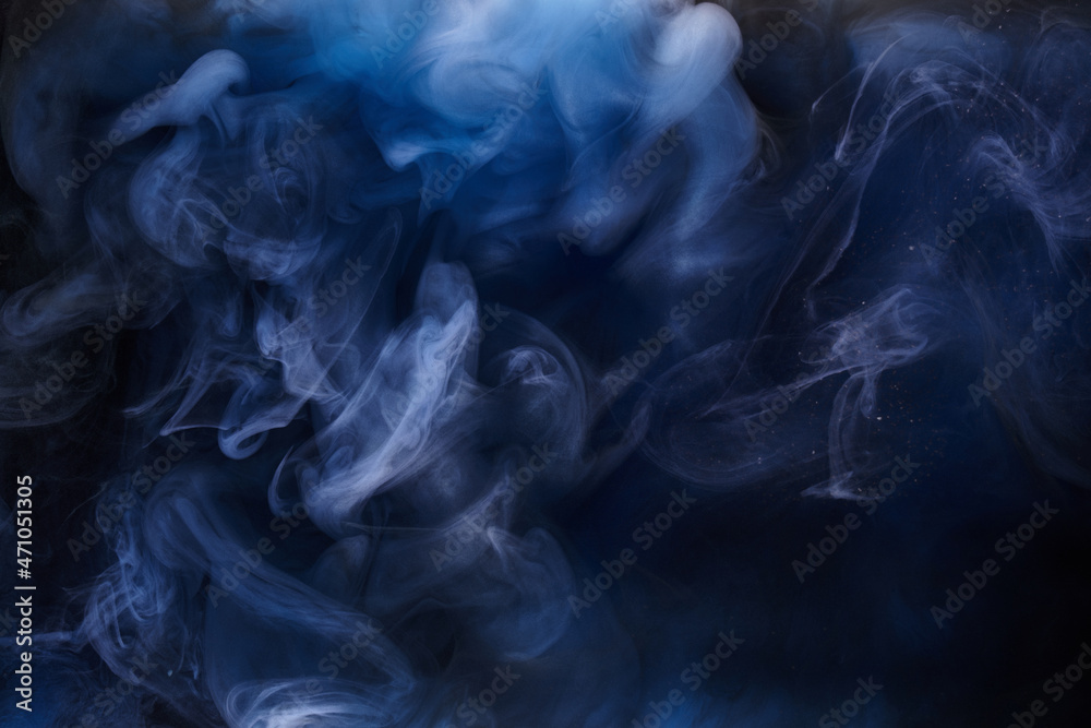 Fototapeta premium Blue smoke on black ink background, colorful fog, abstract swirling ocean sea, acrylic paint pigment underwater