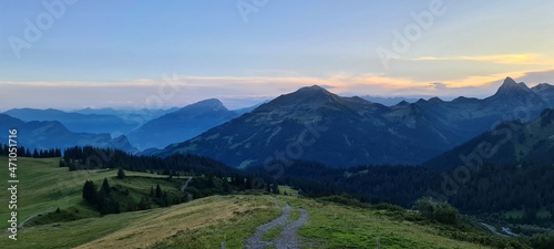 Mountain panorama of the Ratikon Alps in the evening during a hike across Austria and Switzerland.