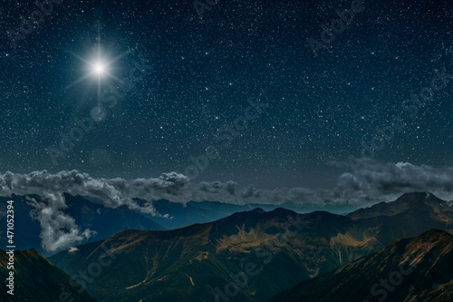 The star shines over the manger of christmas of Jesus Christ. panorama