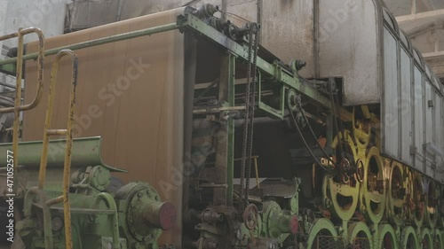 Old Manufactoring equipment Produce Paper Machine Shafts At Paper Mill. equipment. Paper Production. canon log, c log, clog, c-log, ungraded photo