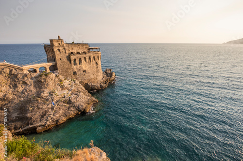 View of Torre Normanna, a medieval tower along Salerno Bay in Maiori, Amalfi Coast, Salerno, Italy.