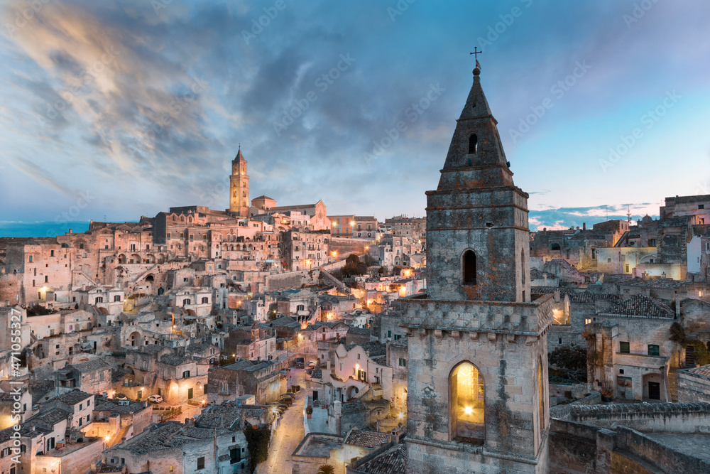 View of Matera old town at sunset in Basilicata, Italy. View of Matera old town at sunset in Basilicata, Italy.