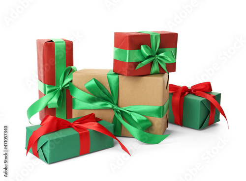 Different beautifully wrapped gift boxes on white background