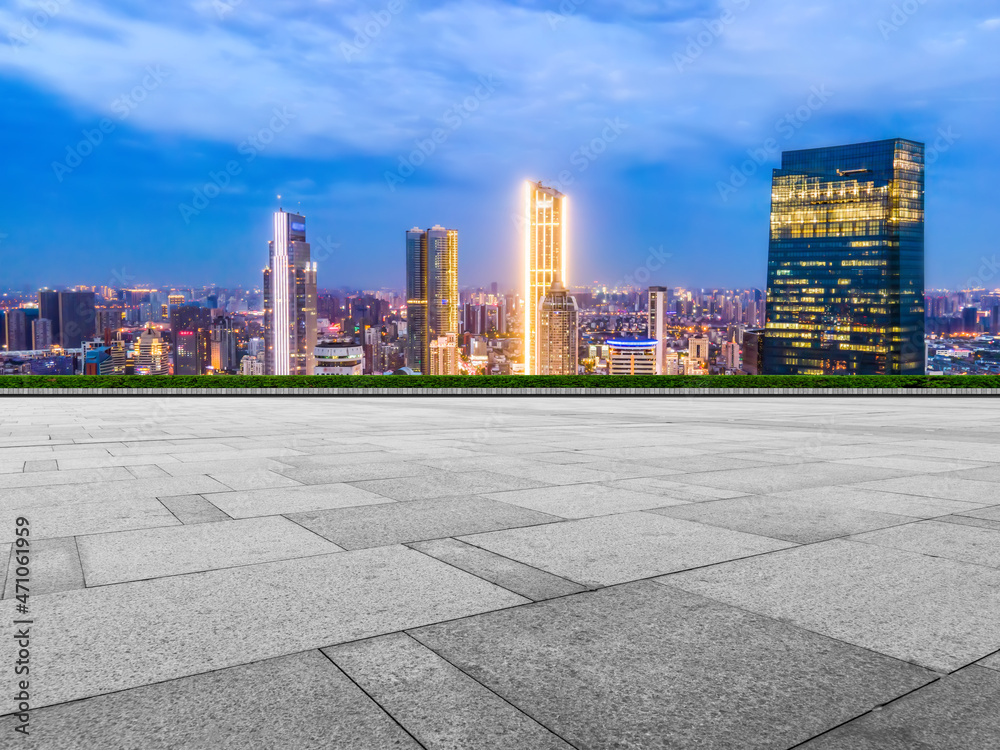 Empty brick floor with city skyline background Empty brick floor with city skyline background