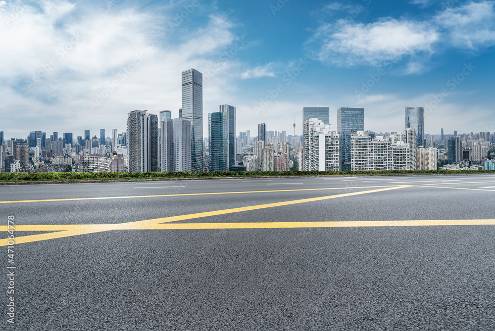 Empty asphalt road and city skyline and building landscape, China. Empty asphalt road and city skyline and building landscape, China.