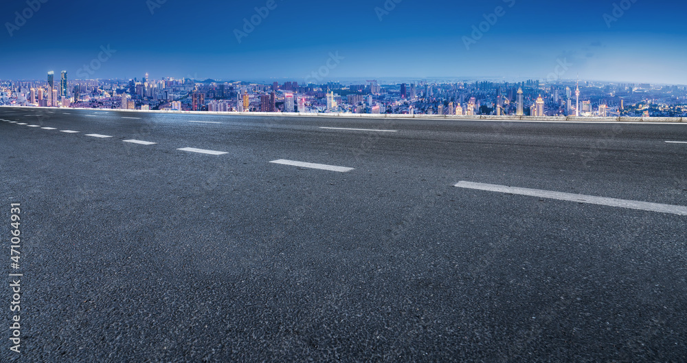 Empty asphalt road and city skyline and building landscape, China. Empty asphalt road and city skyline and building landscape, China.