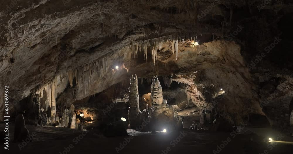Beautiful shots of karst cave, Lipa Cave situated Serbia, East Europe. Illuminated dark cave with stalactites and stalagmites. Unique nature landscape. High quality 4k footage Beautiful shots of karst cave, Lipa Cave situated Serbia, East Europe. Illuminated dark cave with stalactites and stalagmites. Unique nature landscape. High quality 4k footage