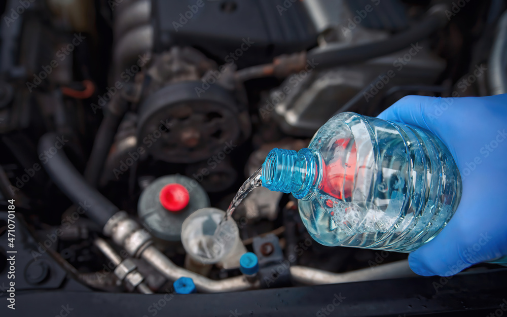 Filling windscreen water tank with winter washer fluid concentrate