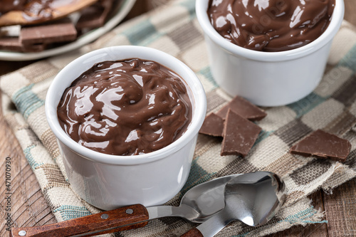 Creamy chocolate pudding in a cup photo
