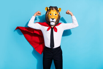 Photo of strong courage guy lion mask save planet world show muscles isolated over blue color background
