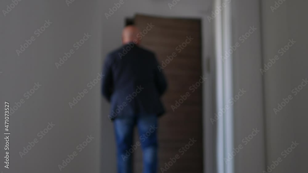 Blurred Person Entering in the Apartment and Turning On the Lights One by One. Businessman Entering in Office and Turning On the Lights. Blurred Person Entering in the Apartment and Turning On the Lights One by One. Businessman Entering in Office and Turning On the Lights.