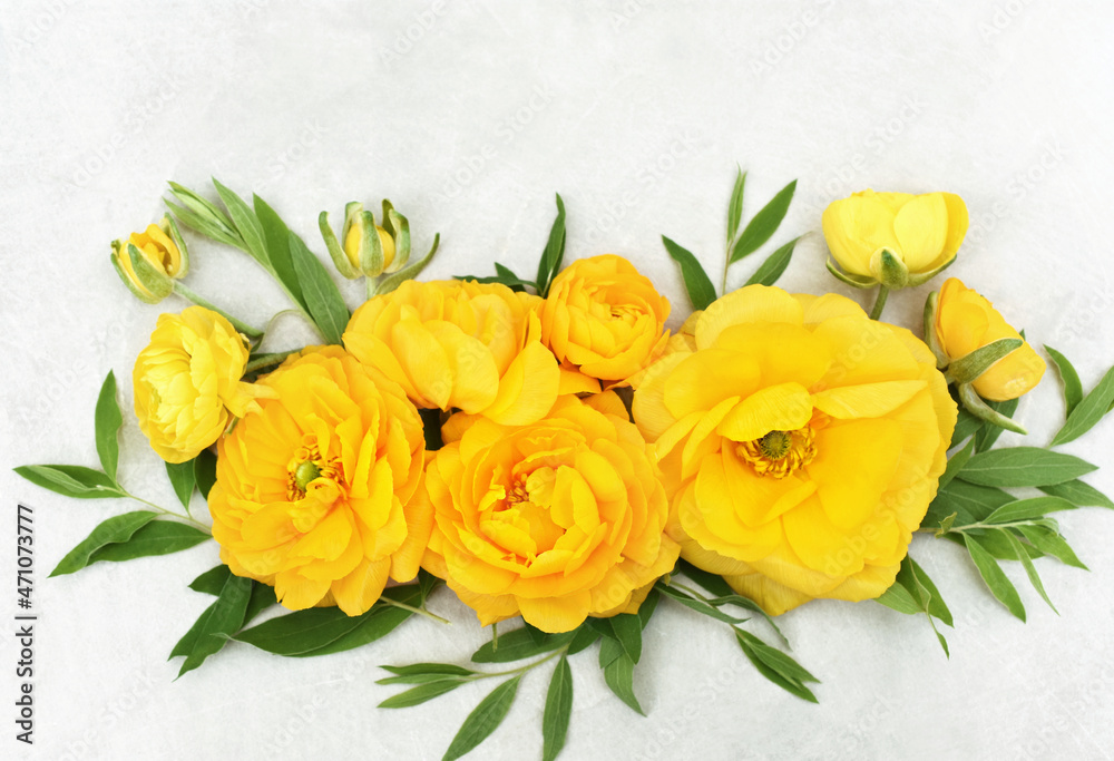 Delicate blossoming yellow ranunculus flowers, blooming festive fall frame background, autumn bouquet floral card, selective focus, toned