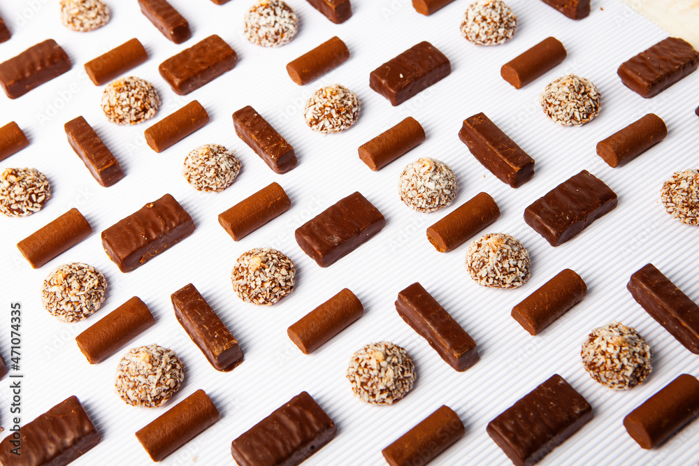 Assortment of delicious chocolate candies background. Chocolate candy isolated Assortment of delicious chocolate candies background. Chocolate candy isolated