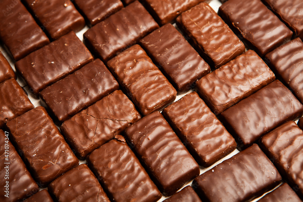 Obraz premium Assortment of delicious chocolate candies background. Chocolate candy isolated 