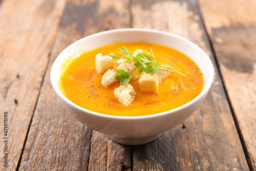 bowl of pumpkin soup and crouton bowl of pumpkin soup and crouton