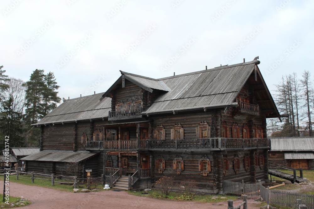 Saint-Petersburg. Wooden three-storey house built in the old Russian style. Saint-Petersburg. Wooden three-storey house built in the old Russian style.