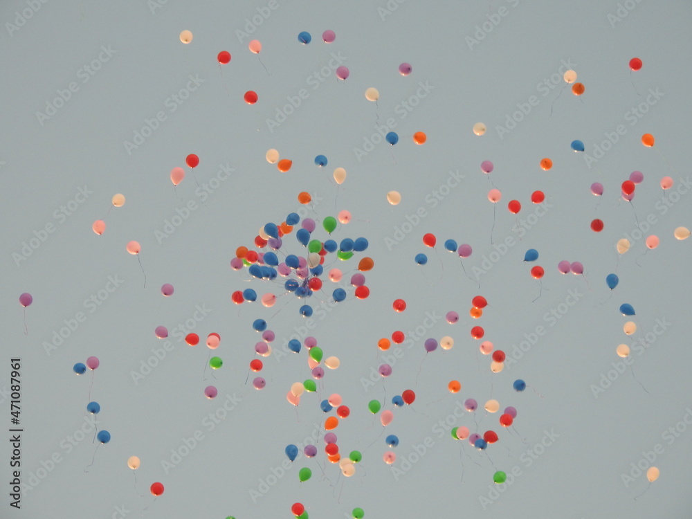 Colorful balloons flying in the sky