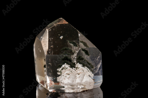 Macro of a mineral quartz stone on a black background