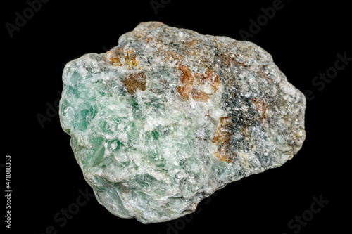 Macro of a stone Talc mineral on a black background photo