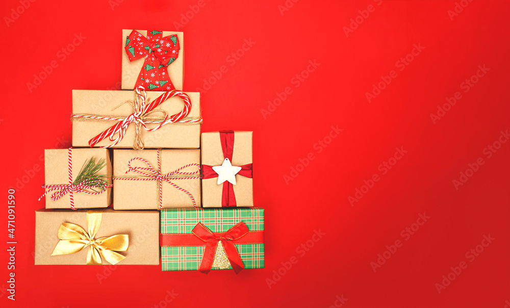 Gifts in the shape of a Christmas tree. Banner