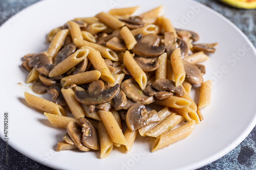 Pasta with mushrooms. Ideal dish for a vegan diet.