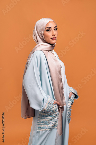 Young muslim woman looking at camera.