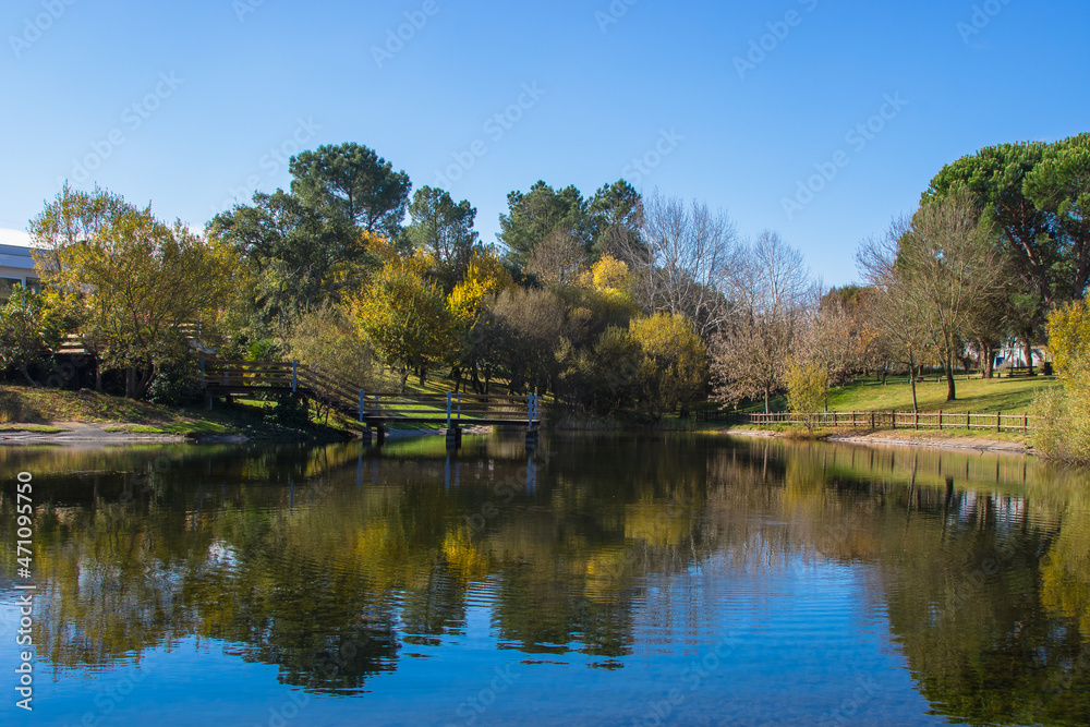 Beautiful lake with wooden pontoon in the environmental park of Santa Margarida da Coutada, located in Constancia - Portugal Beautiful lake with wooden pontoon in the environmental park of Santa Margarida da Coutada, located in Constancia - Portugal
